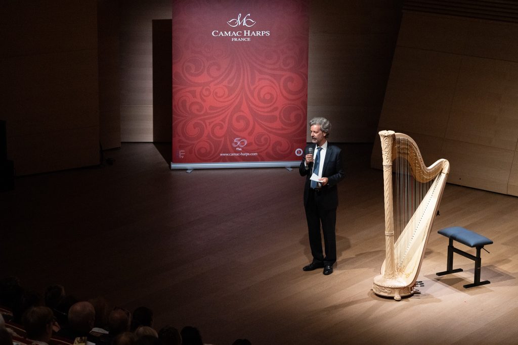 Camac president Jakez François introduces Shamim Minoo